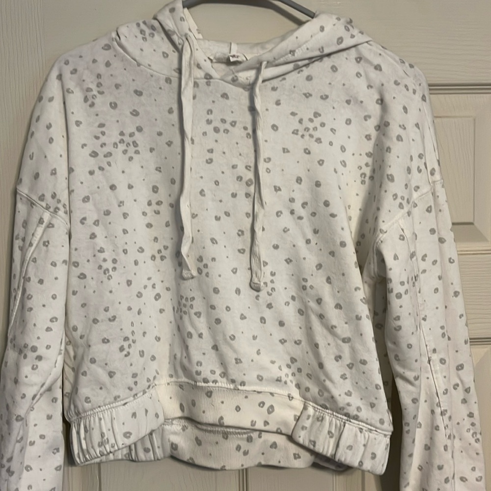 Hoodie with cinched waist.